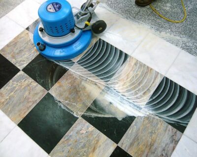closeup shot of tiles cleaning with a machine